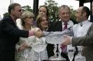 On The Winner's Podium, Steve congratulates jockey Olivier Peslier