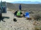 MAG team, Harriett, Julia and Max prepare a fruit & water rest-stop